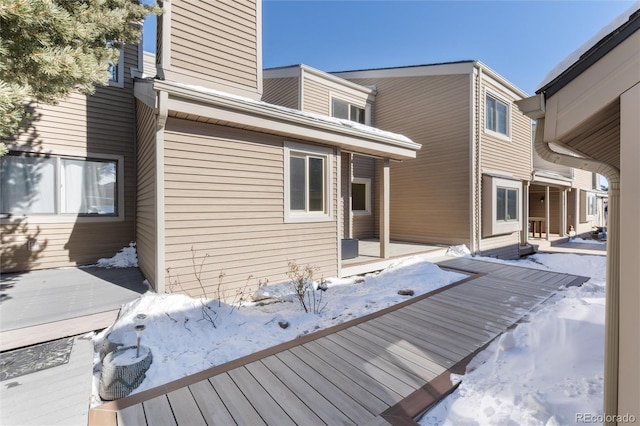 view of snow covered deck