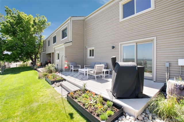 6980 Fargo Trl, Littleton, CO 80125 - rear view of house with a garden, a deck, and an outdoor living space