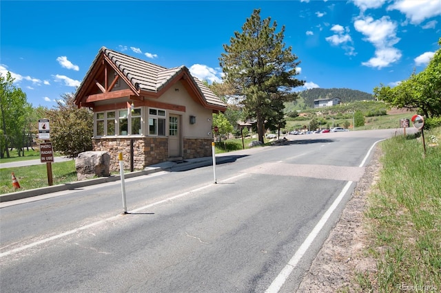 6980 Fargo Trl, Littleton, CO 80125 - view of asphalt street featuring traffic signs and a mountain view