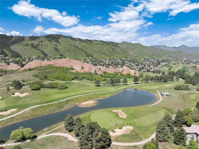 6980 Fargo Trl, Littleton, CO 80125 - view of community featuring a water and mountain view, view of golf course, and a residential view