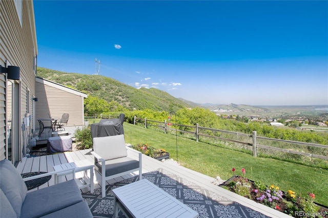 6980 Fargo Trl, Littleton, CO 80125 - view of patio / terrace featuring an outdoor living space and a deck with mountain view