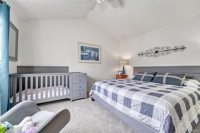 bedroom featuring carpet flooring, ceiling fan, and lofted ceiling