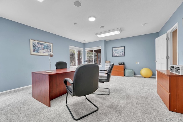 office area featuring carpet floors and baseboards