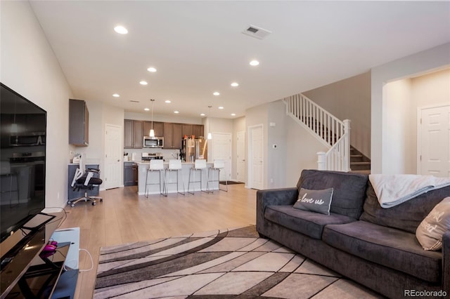 living room featuring light hardwood / wood-style floors