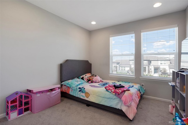 bedroom with light carpet, baseboards, and recessed lighting