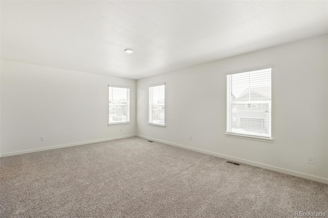 15963 Syracuse St, Thornton, CO 80602 - spare room with light carpet and baseboards