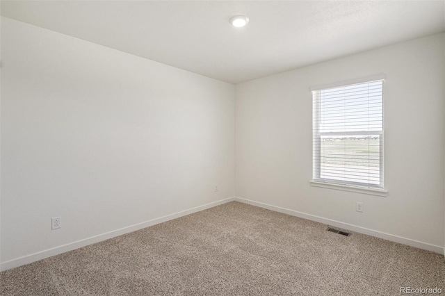 view of carpeted spare room