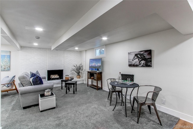 living room with recessed lighting and baseboards