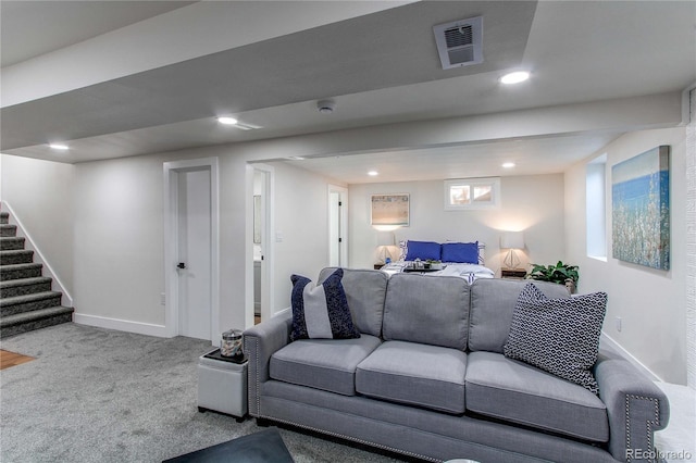 carpeted living area with stairway, recessed lighting, visible vents, and baseboards