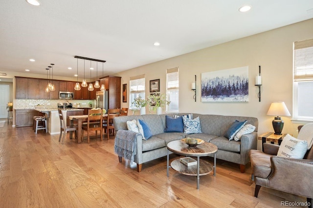 18067 E Anthem Dr, Parker, CO 80134 - living room with light wood-style flooring and recessed lighting