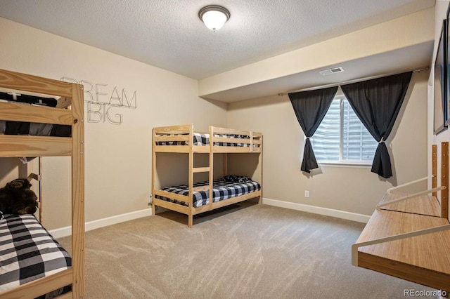 18067 E Anthem Dr, Parker, CO 80134 - bedroom with carpet flooring, a textured ceiling, and baseboards