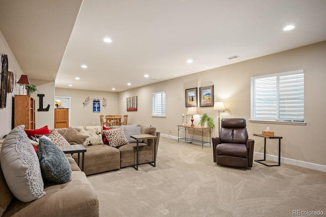 18067 E Anthem Dr, Parker, CO 80134 - living room with recessed lighting, baseboards, and light colored carpet