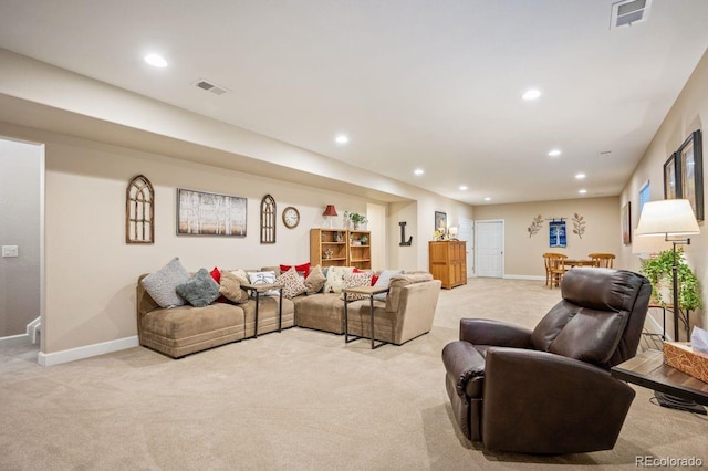 18067 E Anthem Dr, Parker, CO 80134 - living area with light colored carpet, baseboards, and recessed lighting