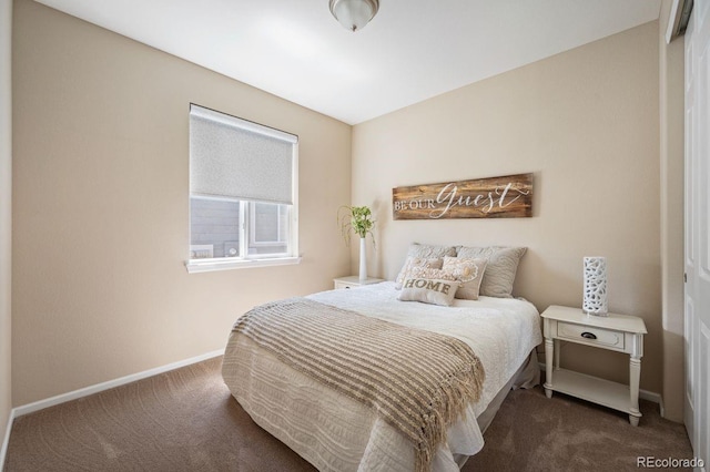 18067 E Anthem Dr, Parker, CO 80134 - bedroom with dark colored carpet and baseboards