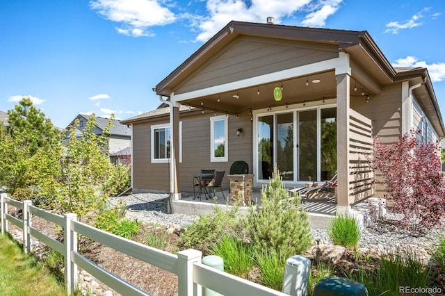 18067 E Anthem Dr, Parker, CO 80134 - rear view of property featuring a patio