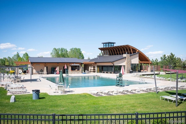18067 E Anthem Dr, Parker, CO 80134 - community pool featuring a patio area