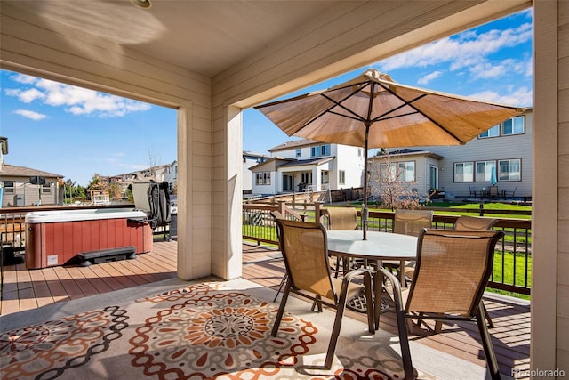 view of patio with a wooden deck and a hot tub