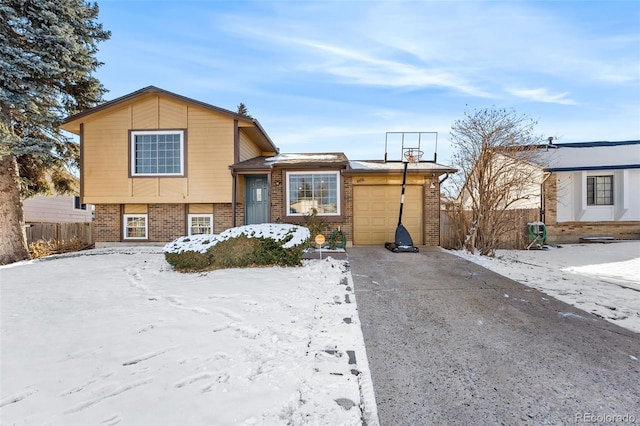 split level home featuring a garage