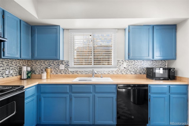 kitchen with black appliances, blue cabinets, sink, and tasteful backsplash