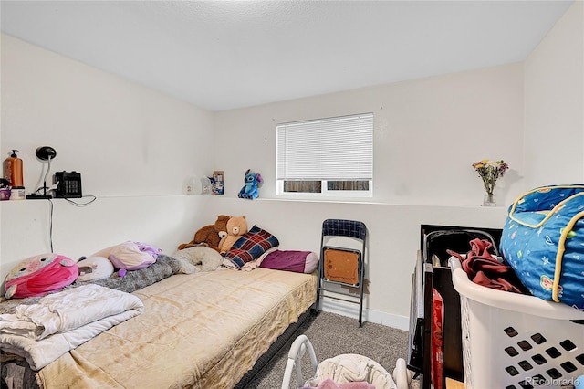 bedroom featuring carpet