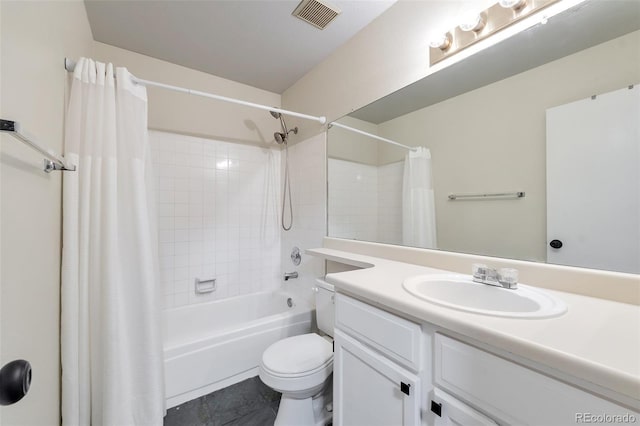 full bathroom featuring vanity, shower / bath combo, and toilet