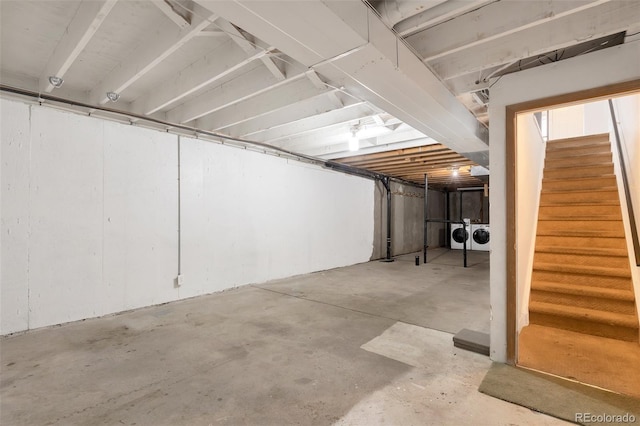 basement with washing machine and dryer