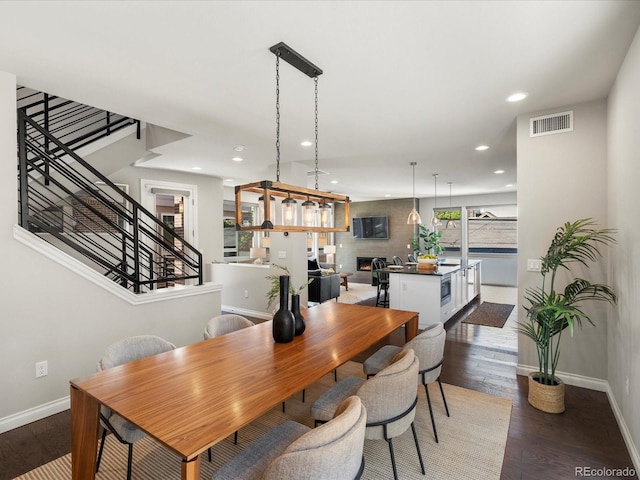 1819 Gaylord St, Denver, CO 80206 - dining room featuring stairway, recessed lighting, and wood finished floors