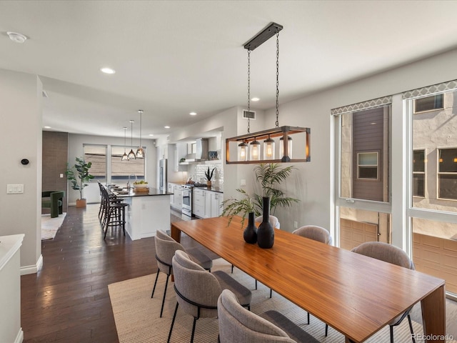 1819 Gaylord St, Denver, CO 80206 - dining area with dark wood-style floors and recessed lighting