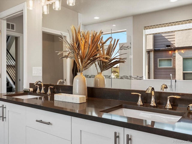 1819 Gaylord St, Denver, CO 80206 - full bathroom featuring double vanity, backsplash, and recessed lighting