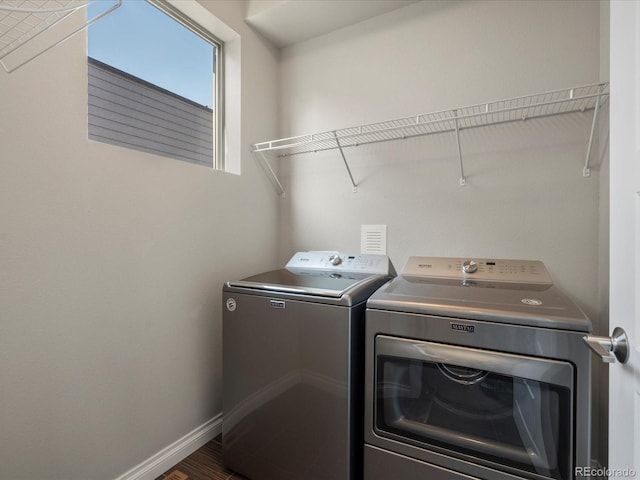 1819 Gaylord St, Denver, CO 80206 - laundry area featuring washer and dryer and baseboards
