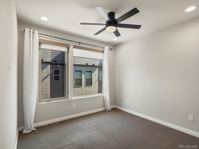 1819 Gaylord St, Denver, CO 80206 - spare room featuring carpet, a ceiling fan, and recessed lighting