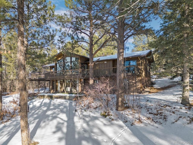 view of front of house with a wooden deck