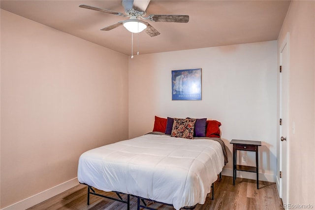 919 S Dawson Way Unit 14, Aurora, CO 80012 - bedroom featuring wood finished floors and ceiling fan