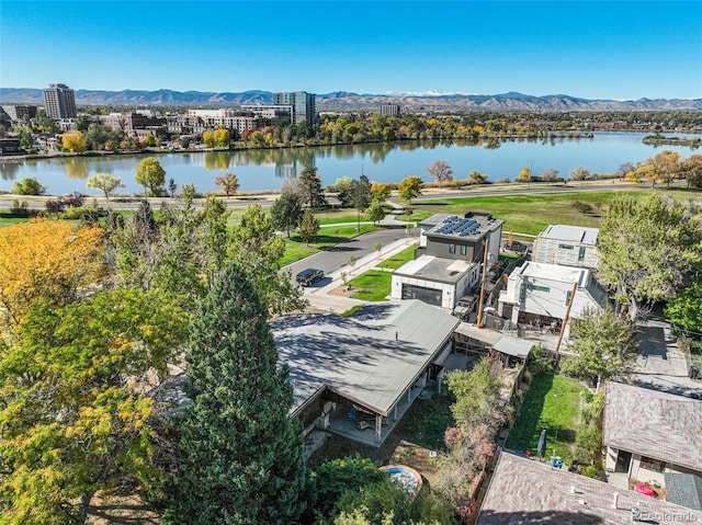 birds eye view of property featuring a water and mountain view