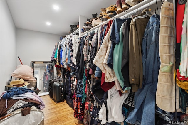 walk in closet featuring hardwood / wood-style floors