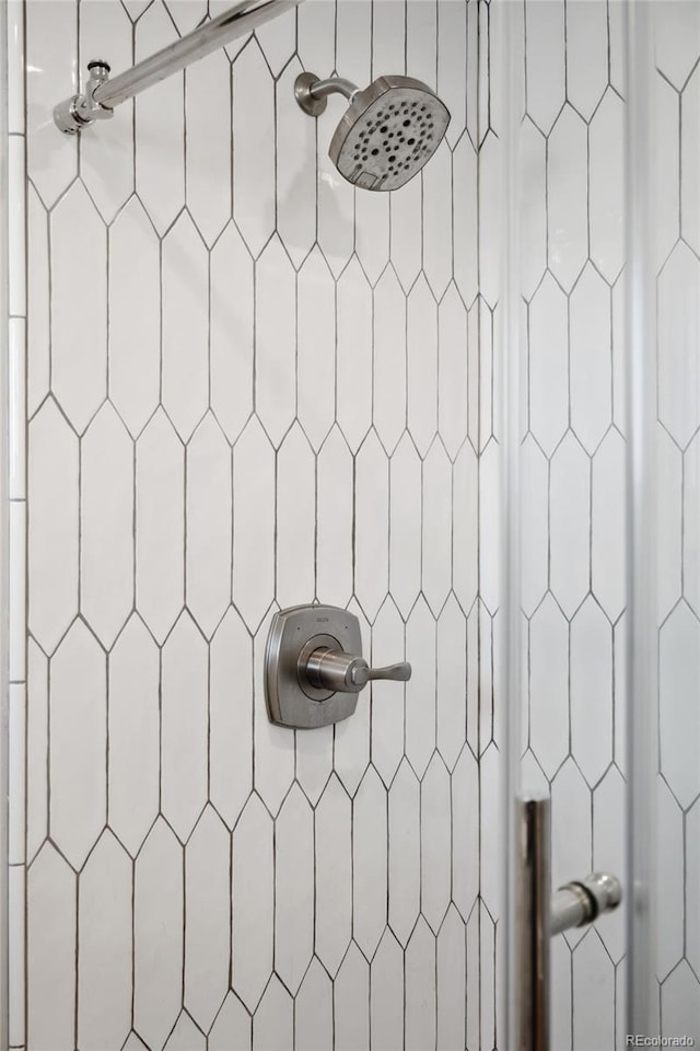 details featuring a tile shower