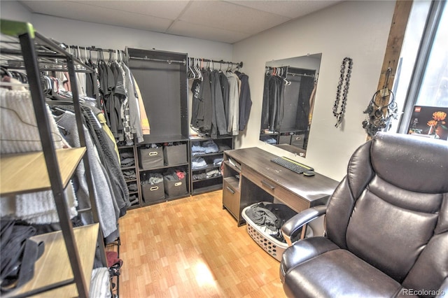 3643 Queen Anne Way, Colorado Springs, CO 80917 - walk in closet featuring a drop ceiling and wood finished floors