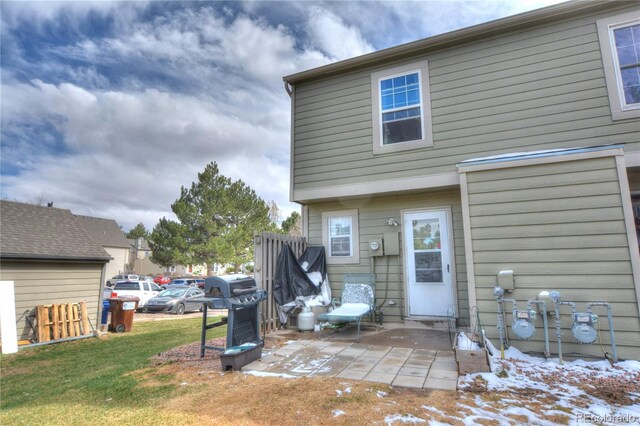 3643 Queen Anne Way, Colorado Springs, CO 80917 - back of property with a patio and a lawn