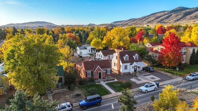 drone / aerial view featuring a mountain view