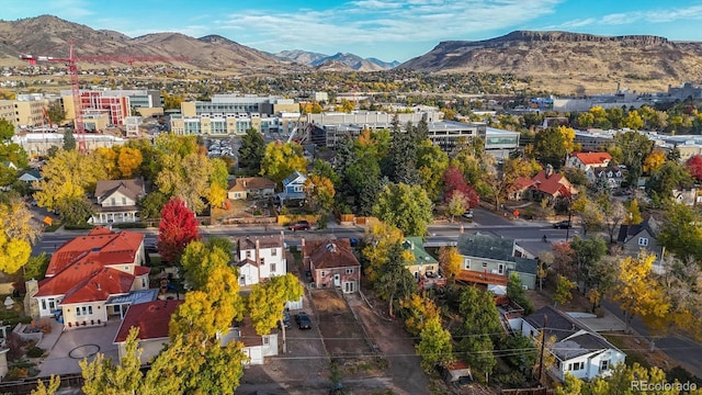 drone / aerial view featuring a mountain view