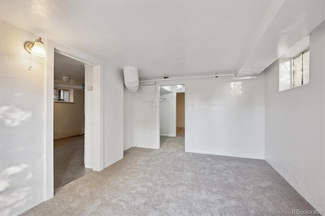 unfurnished room featuring carpet floors