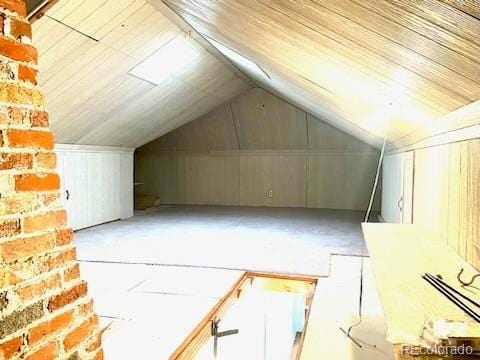 bonus room with vaulted ceiling