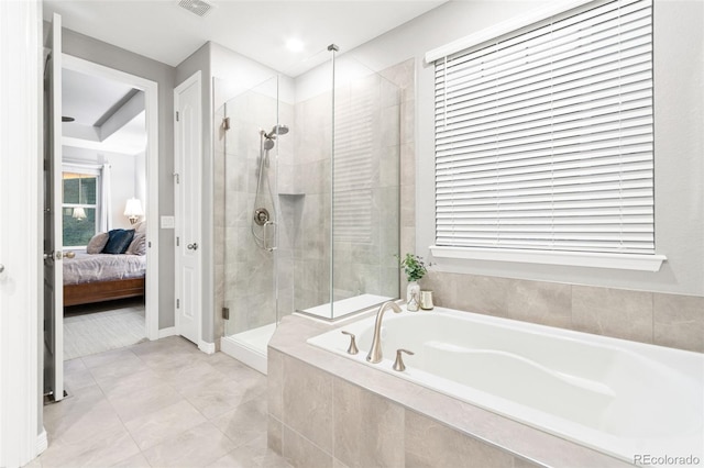 18922 W 84th Ave, Arvada, CO 80007 - bathroom featuring a bath, visible vents, a shower stall, tile patterned floors, and connected bathroom