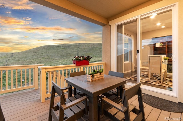 18922 W 84th Ave, Arvada, CO 80007 - deck at dusk with outdoor dining space