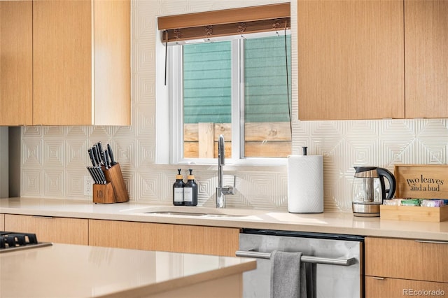 4966 Knox Ct, Denver, CO 80221 - kitchen with stainless steel dishwasher, backsplash, light countertops, light brown cabinetry, and gas cooktop