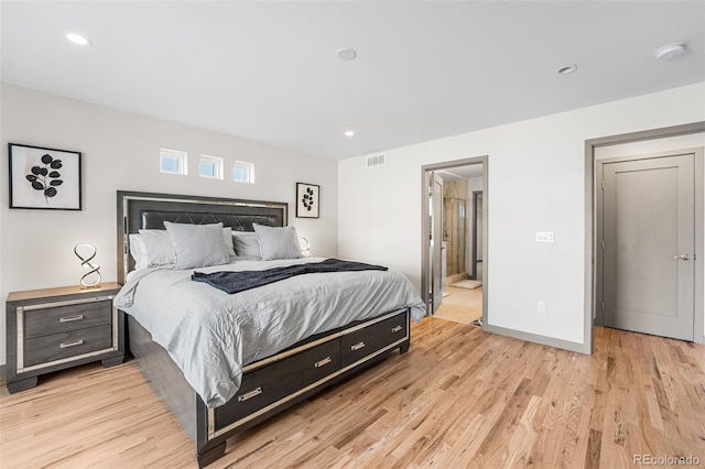 4966 Knox Ct, Denver, CO 80221 - bedroom featuring light wood-type flooring, recessed lighting, and ensuite bath