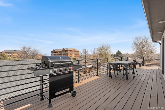 4966 Knox Ct, Denver, CO 80221 - wooden deck featuring a grill and outdoor dining space
