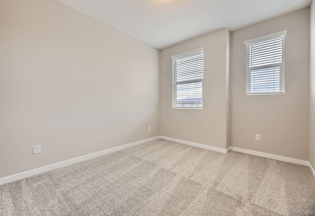 empty room with carpet flooring