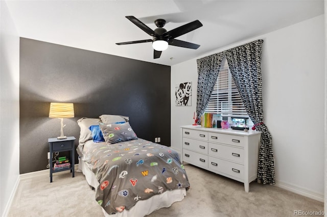 10546 Sundial Rim Rd, Highlands Ranch, CO 80126 - bedroom featuring light colored carpet, baseboards, and ceiling fan