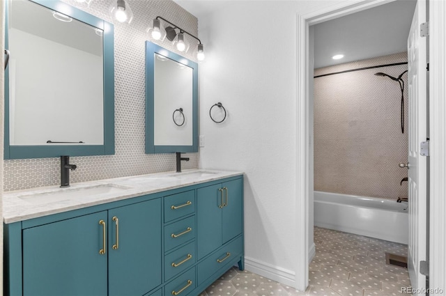 10546 Sundial Rim Rd, Highlands Ranch, CO 80126 - full bathroom featuring double vanity,  shower combination, backsplash, and baseboards